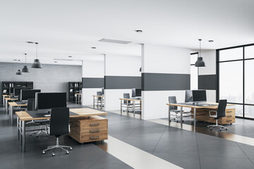 Luxury office interior with rows of computer tables