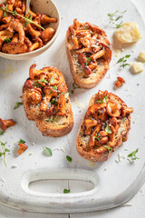 Rustic Toast made of wild mushrooms, thyme and olive