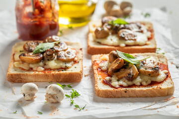 Rustic Toast with mushrooms, basil and cheese
