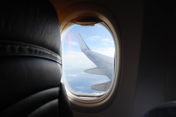 Naklejka premium Beautiful view through plane window during flight. Air travel