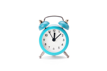 old blue alarm clock isolated on a white background. copy space. studio shot. time symbol. schedule concept