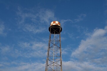 water tower on sky background