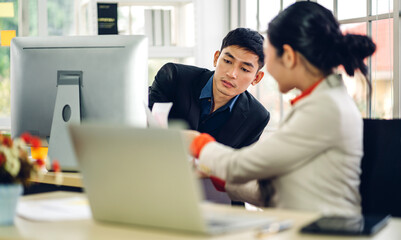 Group of professional business discussing meeting strategy sharing ideas thoughts with project.Creative business people working with laptop computer in green plant terrace decorated modern workloft