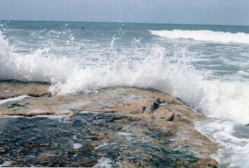 waves crashing on rocks