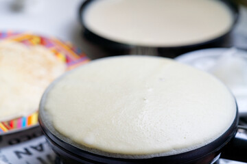 big round pancake on electric frying pan