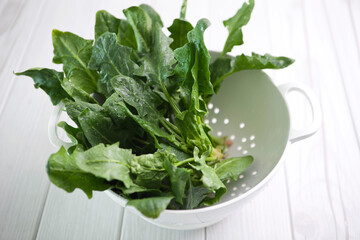 spinach in colander