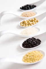 various cereal with spoons