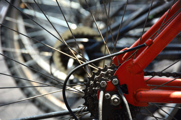 close up of a bicycle wheels and gears