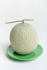 melon on green plate