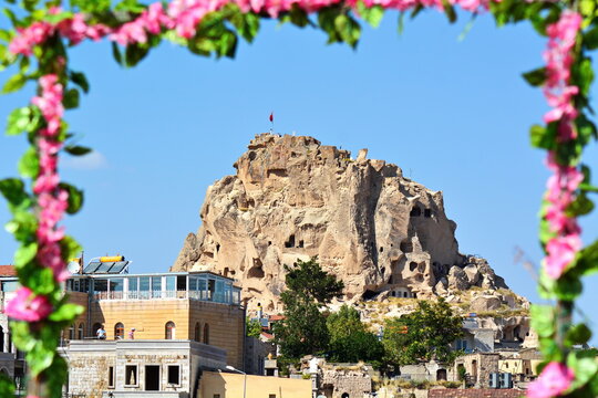 Rear side of antique fortress Uchhisar in Pigeon valley, Goreme, Cappadocia, Turkey