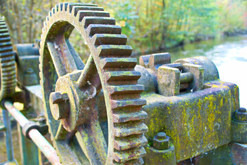 Old rusty gear from a weir