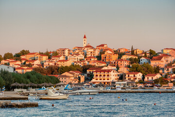 Small Mediterranean town Seget Donji near the Trogir town at sunset, Croatia
