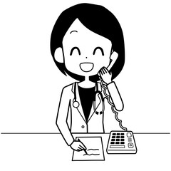 電話診療をする女性医師