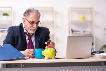 Old businessman employee in bankruptcy concept