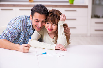 Young couple is very happy in pregnancy planning concept