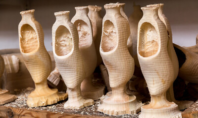 Wooden shoes lasts ,manufactured in Holland, carved on a special lathe await processing into the...