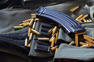 Ammunition 7,62*39.Tactical unloading vest as background.