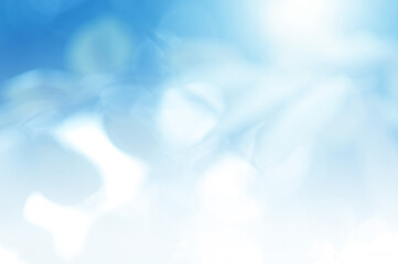 Light blue Leaf background. Blurred leaves and circular bokeh. Abstract for design and wallpaper.