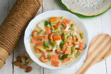 Mutton stew , chicken stew soup side dish for Appam , bread, Kerala breakfast food. Indian food. Christian Christmas food. spicy curry prepared with coconut milk, vegetables ,meat, Indian spices