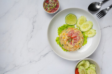 thai food;Fermented pork fried rice served with fresh cucumber