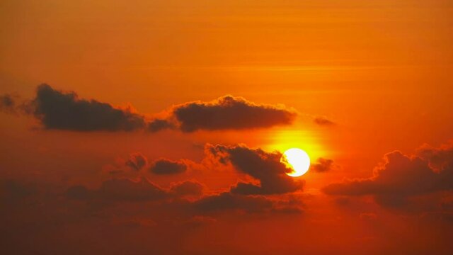 sunset back on red sky and dark cloud moving time lapse