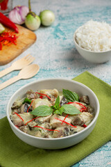 thai food; green coconut curry pork with eggplants
