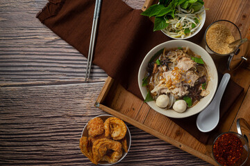 Thai food; Noodles with pork , meatball and vegetable