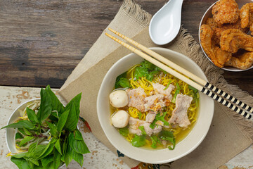 Thai food; Noodles with pork , meatball and vegetable