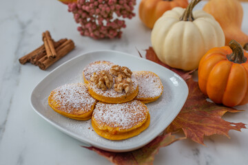 Healthy autumnal breakfast - sweet home made pumpkin pancakes