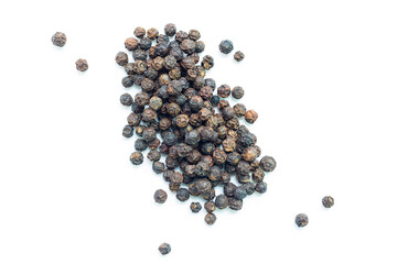 Black peppercorn seeds on white background. Composition isolated over the white background. Top view.