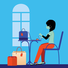 Woman in mask with shopping bags and laptop in cafe