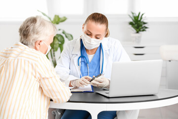 Senior diabetic woman visiting doctor in clinic