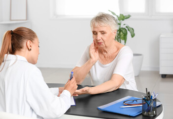 Senior diabetic woman visiting doctor in clinic