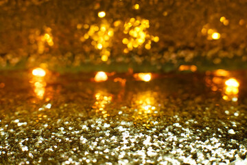 Obraz premium abstract photo of light burst among trees and glitter bokeh. image is blurred