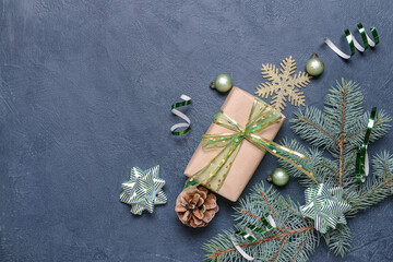Beautiful Christmas decor and gift box on dark background