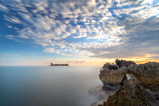 Long exposure landscape of the Maiden's Castle (Turkish: Kizkalesi). The castle was established to prevent attacks from the Sea. It contains remains of a church.