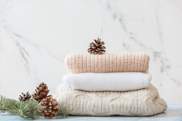 Stylish Christmas clothes on table