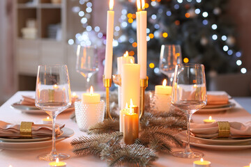 Beautiful table setting with Christmas decorations in living room