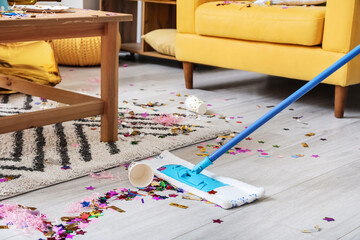 Cleaning of messy room after party celebration