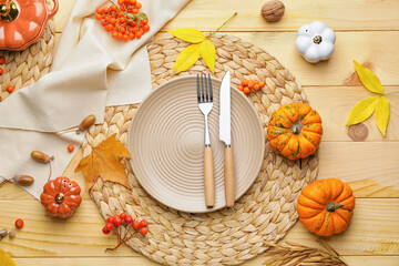 Obraz na płótnie Canvas Beautiful table setting with autumn decor on wooden background
