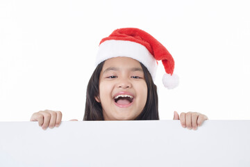 Happy little girl holding a blank board