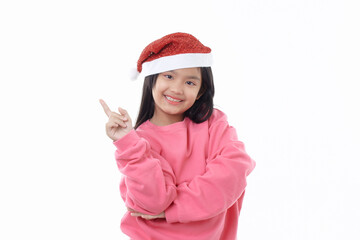 Asian little cute girl wearing Santa Claus cap