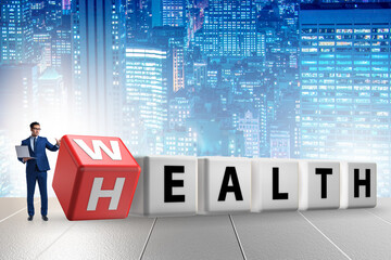Wealth is health concept with businessman