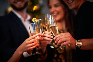 Two beautiful young couples having fun at New Year's Eve Party