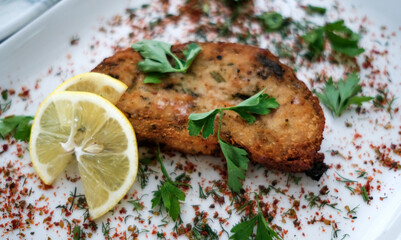 Delicious seafood dish served with lemon and parsley