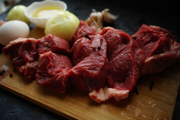 raw meat on a cutting board
