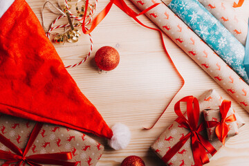 new year gifts and decorations on wooden background.