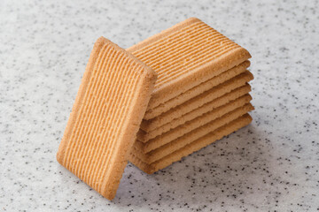 Rectangular shortbread cookies on a light marble top. Homemade baking.