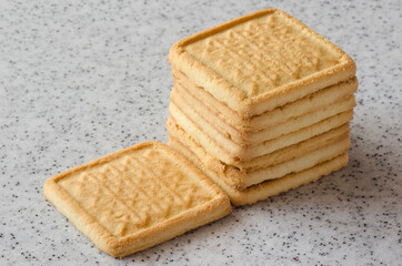 Rectangular shortbread cookies on a light marble top. Homemade baking.