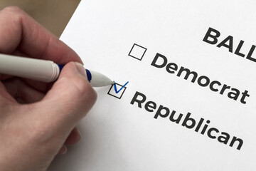 Checklist concept. Voter votes for Republican on the ballot. A checkmark for Republican in the checkbox.